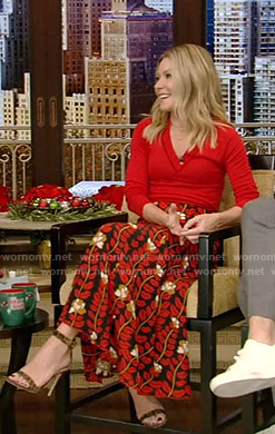 Kelly’s red v-neck sweater and printed skirt on Live with Kelly and Ryan