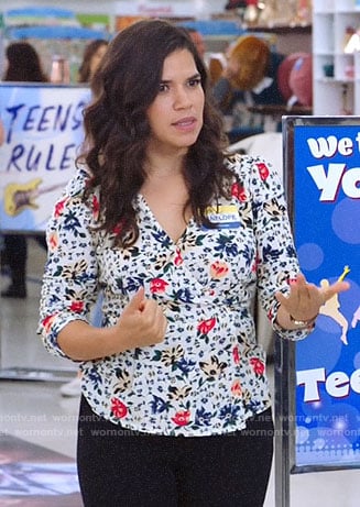 Amy’s white floral wrap top on Superstore