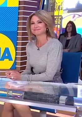 Amy’s grey sweater and plaid mini skirt on Good Morning America