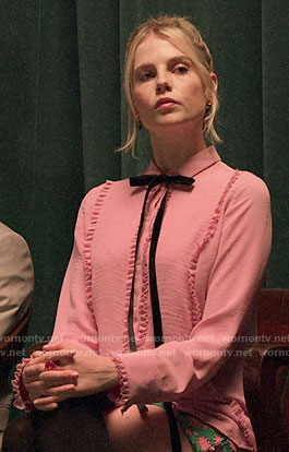 Astrid’s pink ruffled blouse and green floral skirt on The Politician