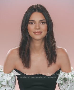 Kendall’s black crop top with printed sleeves on Keeping Up with the Kardashians