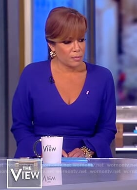 Sunny’s purple v-neck dress with ruffle cuffs on The View