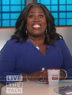 Sheryl’s blue tie neck blouse on The Talk