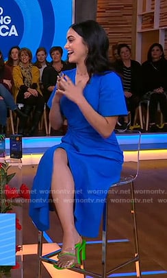 Camila Mendes’s blue short sleeve wrap dress on Good Morning America