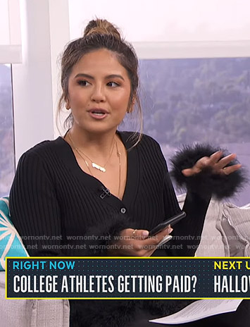 Erin’s black ribbed feather trimmed cardigan on Live from E!