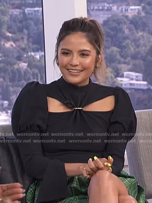 Erin’s black cutout top and green plaid mini skirt on E! News