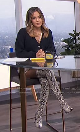 Erin’s navy cardigan and snake print boots on E! News Daily Pop