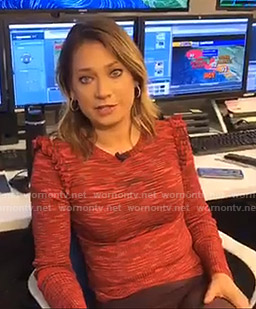 Ginger’s red ruffle shoulder sweater and brown pants on Good Morning America