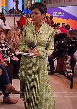 Tamron’s green floral pleated dress on Tamron Hall Show