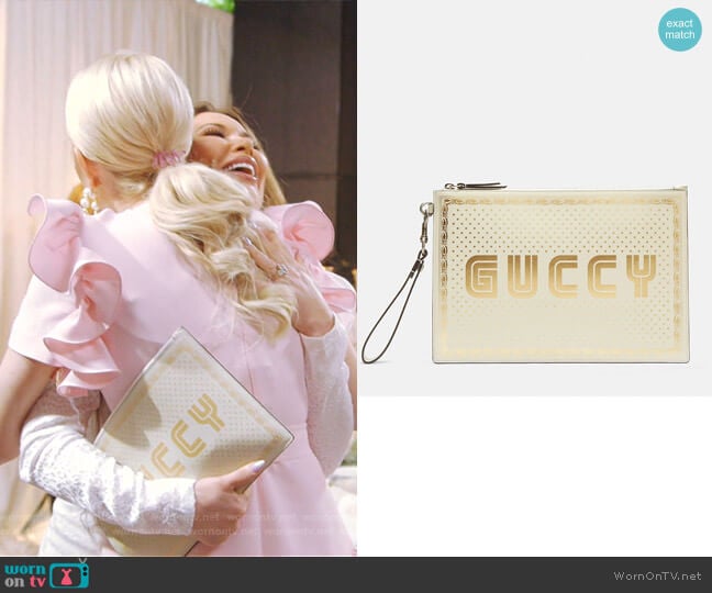 Star Print Guccy Clutch Bag by Gucci worn by LeeAnne Locken on The Real Housewives of Dallas