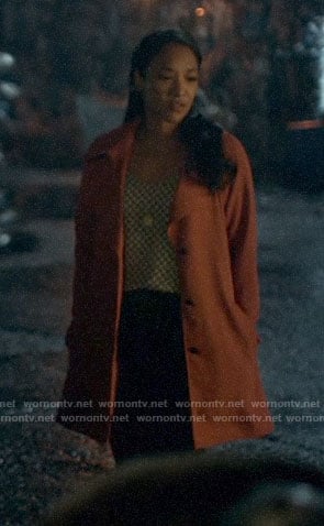 Iris's geometric print top and orange trench coat on The Flash