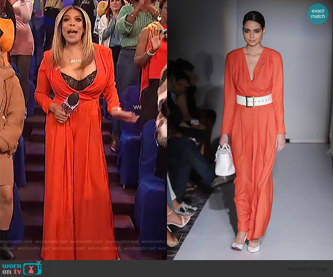 red drape jumpsuit by Jovana Louis worn by Wendy Williams on The Wendy Williams Show