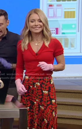 Kelly’s red v-neck sweater and printed skirt on Live with Kelly and Ryan