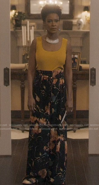 Kerissa's yellow tank top and floral wide leg pants on Greenleaf