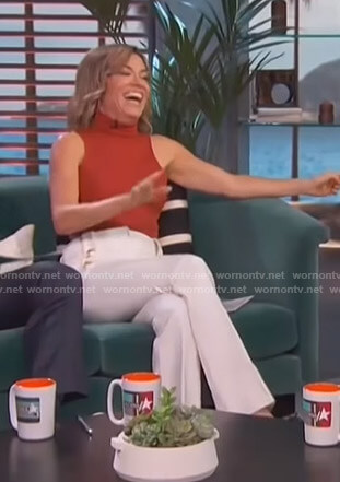 Kit’s white flare pants on Access Hollywood