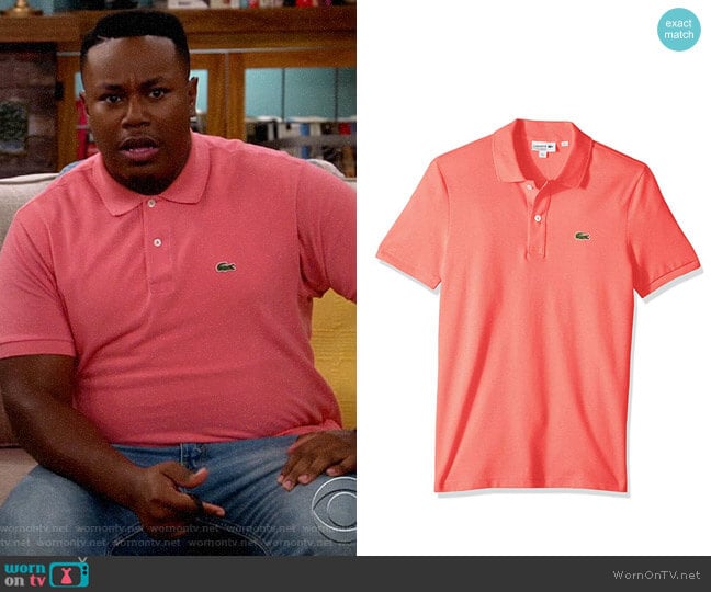 Lacoste Classic Polo Shirt in Amaryllis Pink worn by Marty (Marcel Spears) on The Neighborhood