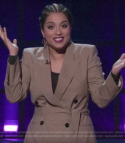 Lilly’s beige double breasted belted blazer on A Little Late with Lilly Singh