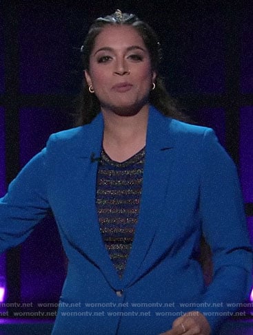 Lilly Singh’s blue suit and metallic striped top on A Little Late with Lilly Singh