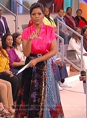 Tamron’s pink satin top and metallic skirt on Tamron Hall Show