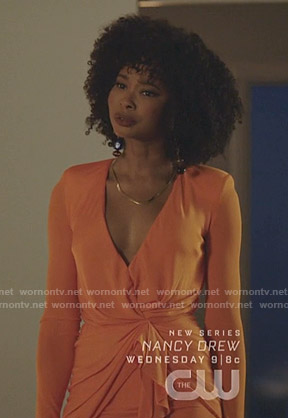 Monica's orange v-neck mini dress on Dynasty