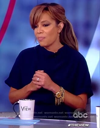 Sunny’s navy short sleeve jumpsuit on The View