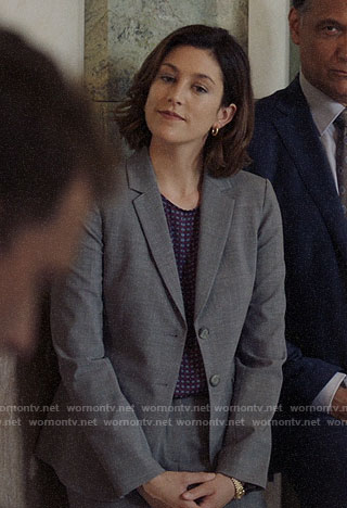 Sydney's grey suit and purple printed top on Bluff City Law