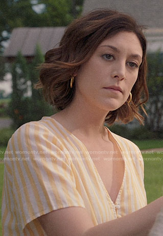 Sydney's yellow striped v-neck top on Bluff City Law