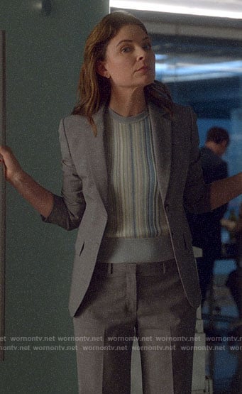 Taylor’s grey suit and blue striped top on Bull