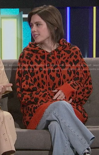 Tegan's orange leopard hoodie on A Little Late with Lilly Singh