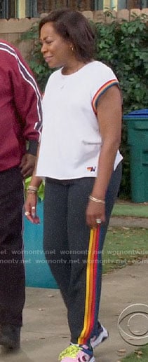 Tina's rainbow stripe trim tee and sweatpants on The Neighborhood