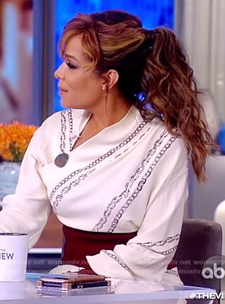 Sunny’s white chain contrast blouse and skirt on The View