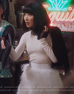 Mei’s lace trim sweater and feather skirt on Sunnyside