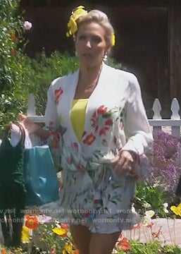 Braunwyn’s white floral wrap dress on The Real Housewives of Orange County