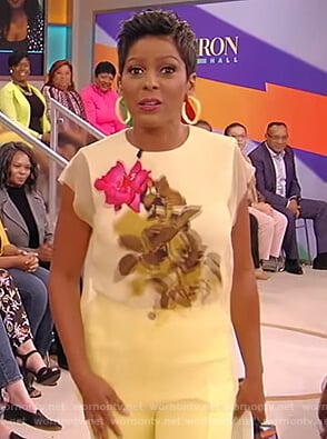 Tamron’s yellow floral mesh top on the Tamron Hall Show