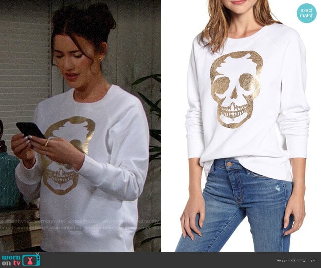 Zadig & Voltaire Metallic Skull Sweatshirt worn by Steffy Forrester (Jacqueline MacInnes Wood) on The Bold and the Beautiful