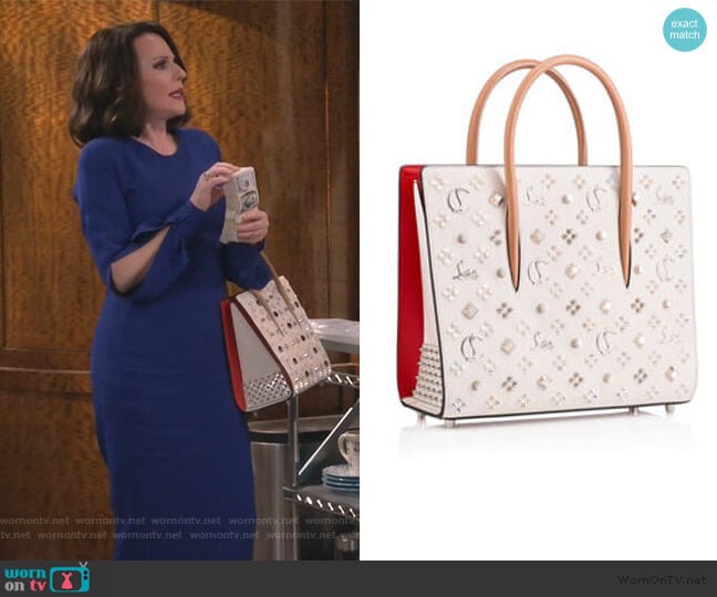 Megan Studded Paloma Tote by Christian Louboutin worn by Karen Walker (Megan Mullally) on Will and Grace