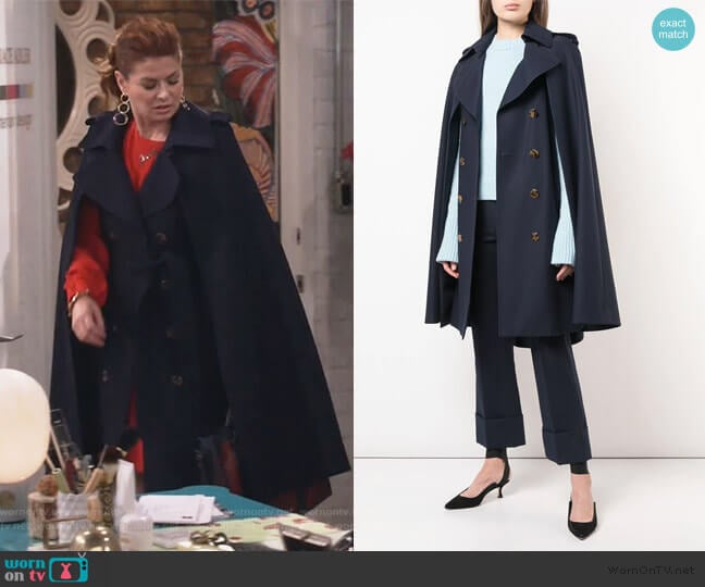 The Donna Trench Cape Coat by Khaite worn by Grace Adler (Debra Messing) on Will and Grace