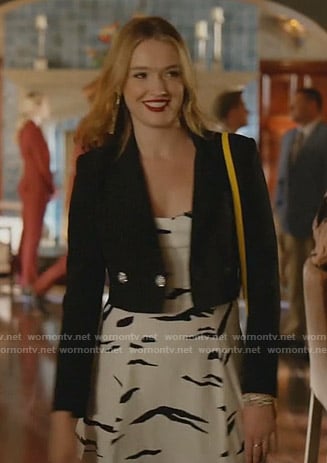 Kirby’s white printed dress and black cropped jacket on Dynasty