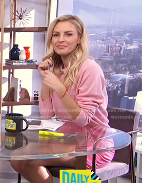 Morgan’s pink sweater and mini skirt on E! News Daily Pop