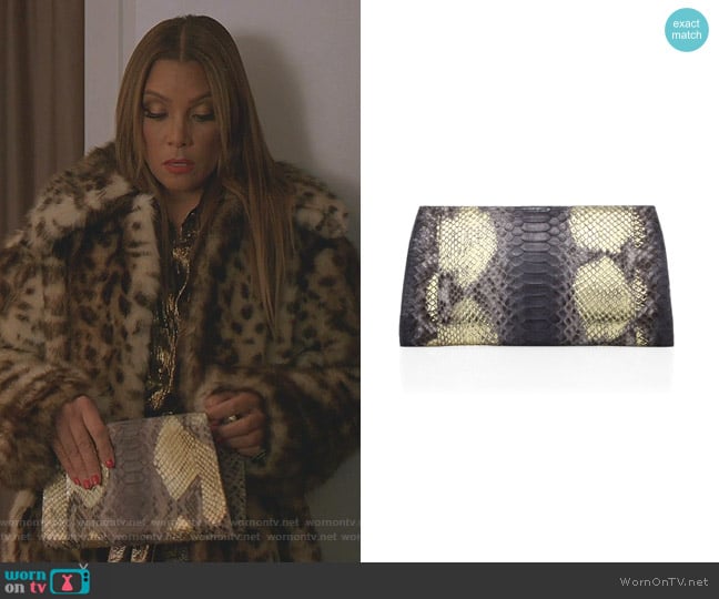 Python Slicer Clutch by Nancy Gonzalez worn by Dominique Deveraux (Michael Michele) on Dynasty