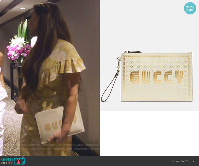 Star Print Guccy Clutch Bag by Gucci worn by LeeAnne Locken  on The Real Housewives of Dallas