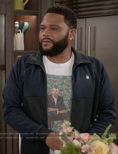 Andre's Obama portrait t-shirt and navy track jacket on Black-ish