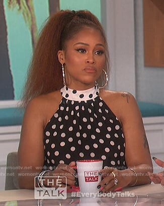 Eve’s polka dot top and skirt on The Talk