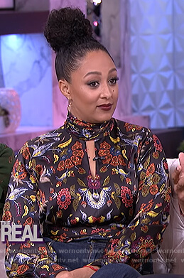 Tamera’s black floral print keyhole blouse on The Real