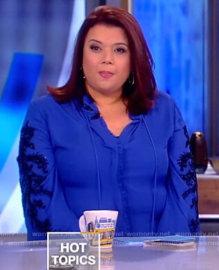 Ana’s blue embellished tie neck blouse on The View