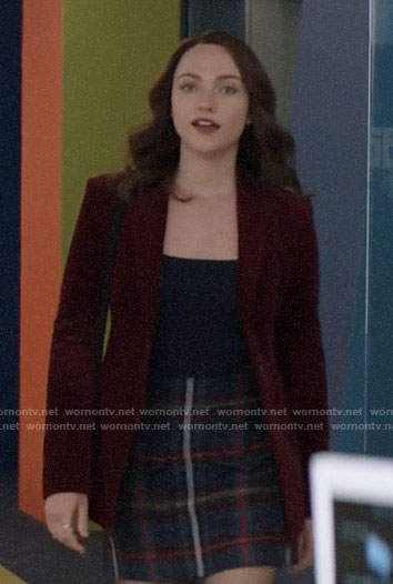 Cara’s plaid skirt and red corduroy blazer on God Friended Me