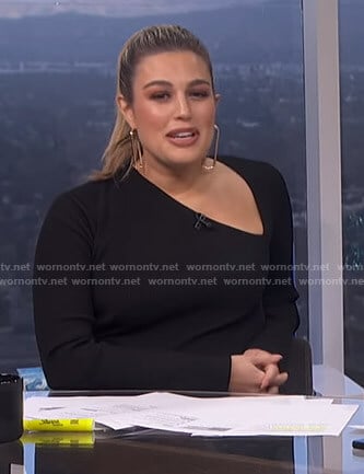 Carissa’s black asymmetric neckline dress on E! News Daily Pop