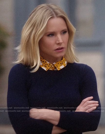 Eleanor’s navy sweater and yellow sheep print shirt on The Good Place