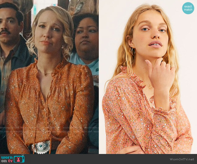 Ginny’s orange floral blouse on Perfect Harmony