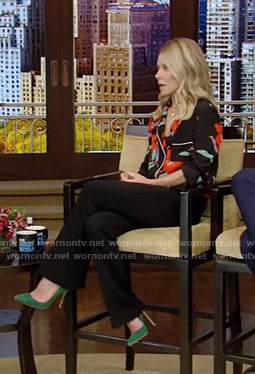 Kelly’s black floral shirt and flare pants on Live with Kelly and Ryan